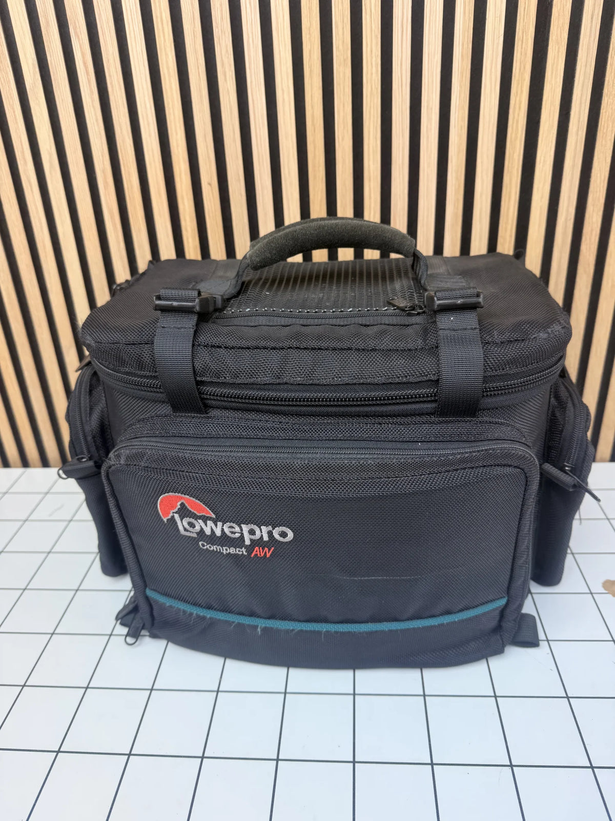 compact AW camera tas